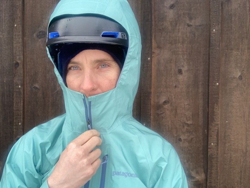 patagonia storm10 for women - the storm10 will go over a helmet, but it's a bit snug.