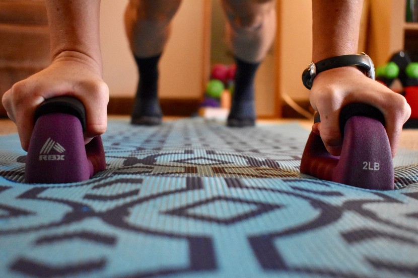 testing the comfort of the rbx push-up bars through a series of...