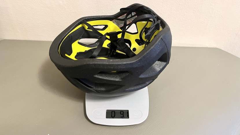 climbing helmet - we use a precise scale to measure each helmet's weight.