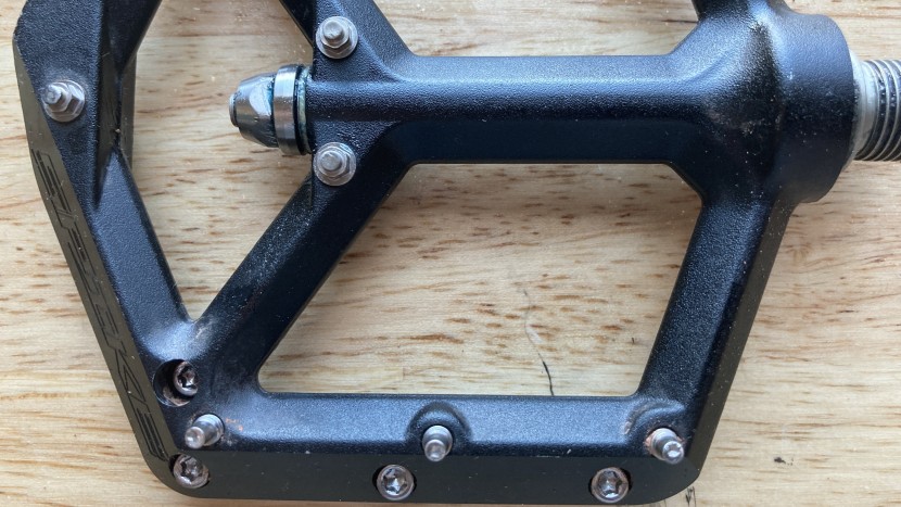 this pedal uses a machined aluminum platform with pins along the...