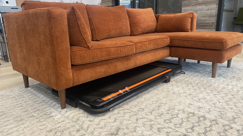 the urevo treadmill stashes out of sight.