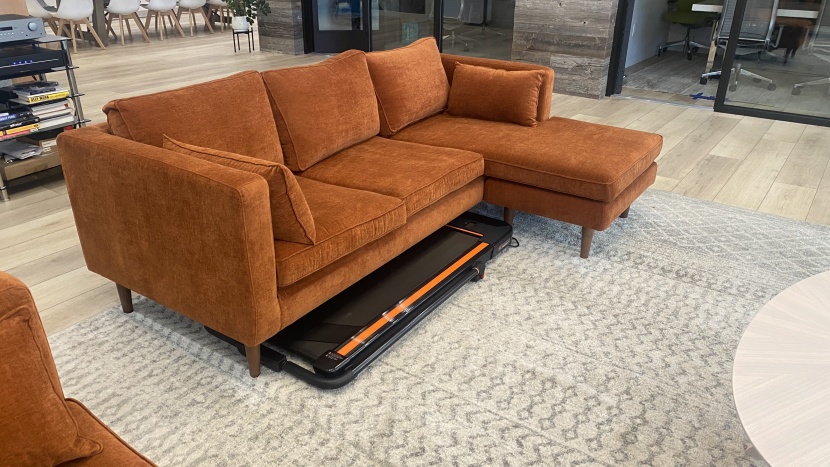 treadmill - the urevo treadmill easily slides beneath a couch for storage.
