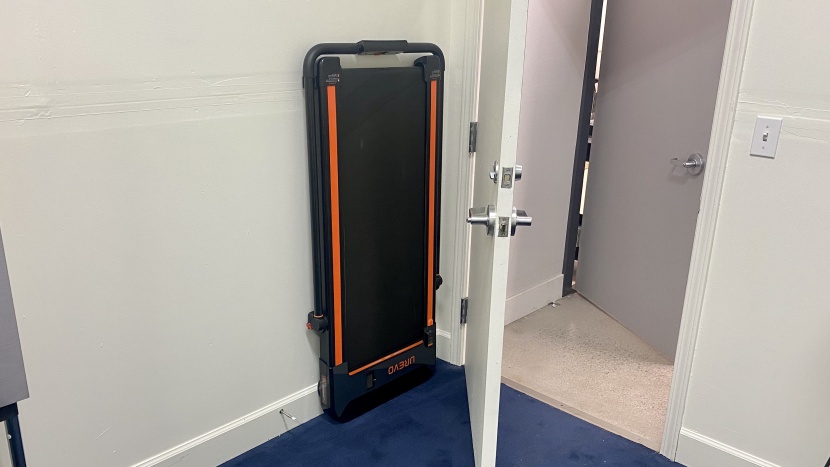 the small footprint of the urevo treadmill can be stashed almost...