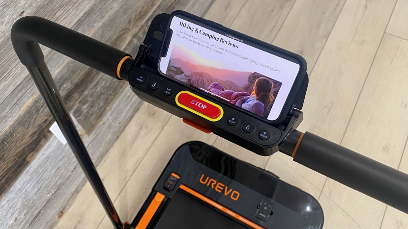 urevo 2 in 1 folding treadmill - the phone holder is simple and effective.