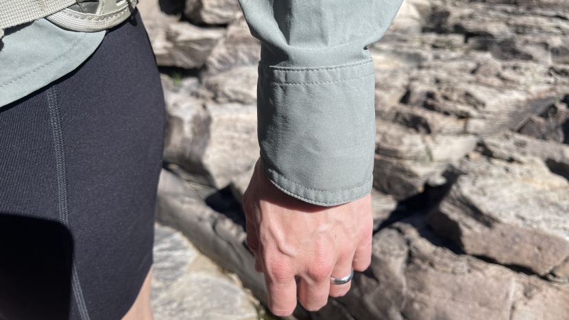 the cuffs are longer on the backs of your hands, to add extra sun...