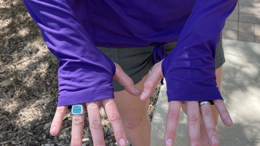 wearing the thumholes means the backs of your hands are protected...