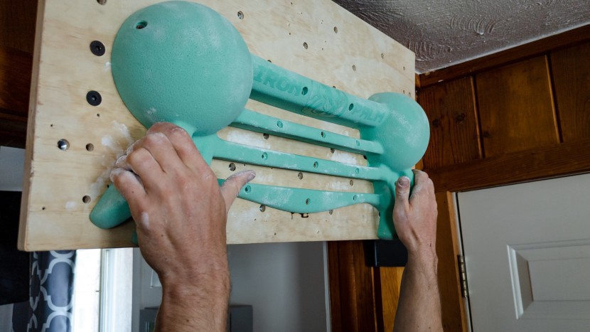 hangboard - no thumbs needed on the easy to cheat vertical pinches of the iron...