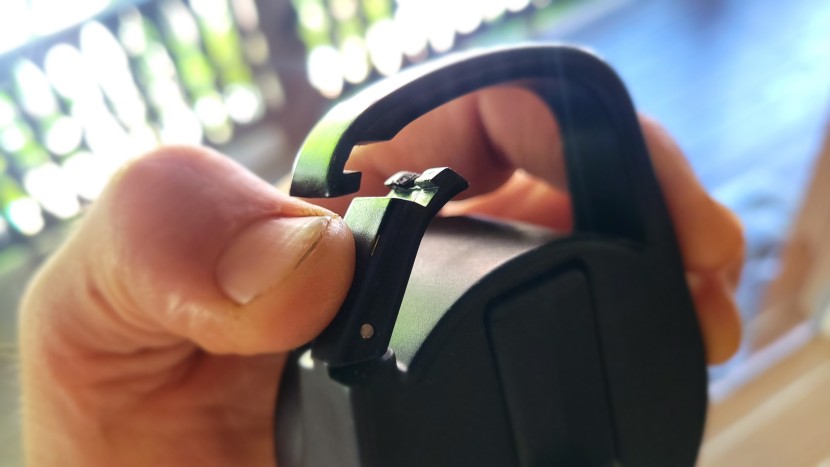 water bottle - the carabiner-style clip on the iron flask's lid aids in carrying.