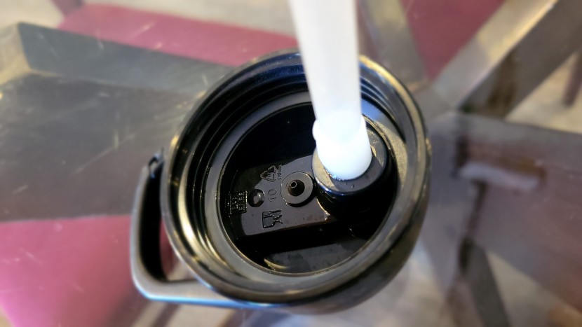 iron flask insulated - the underside of the iron flask insulated bottle's straw lid. note...