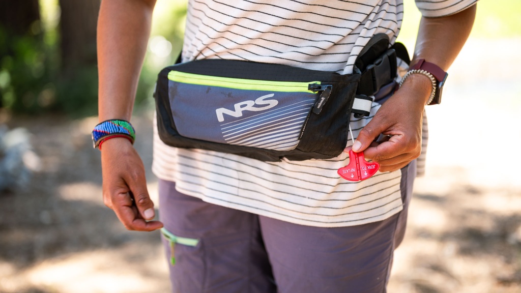 nrs zephyr - the tab to inflate this pfd is large and easy to grab if you're...