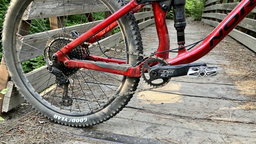 norco fluid fs 4 - a shimano 11-speed derailleur is paired with a sunrace wide-range...