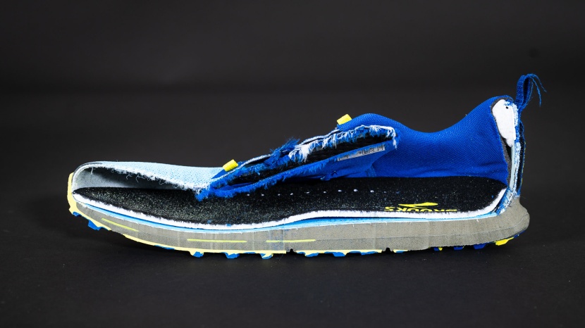a side profile of the brooks cascadia 17. yellow trail adapt can be...