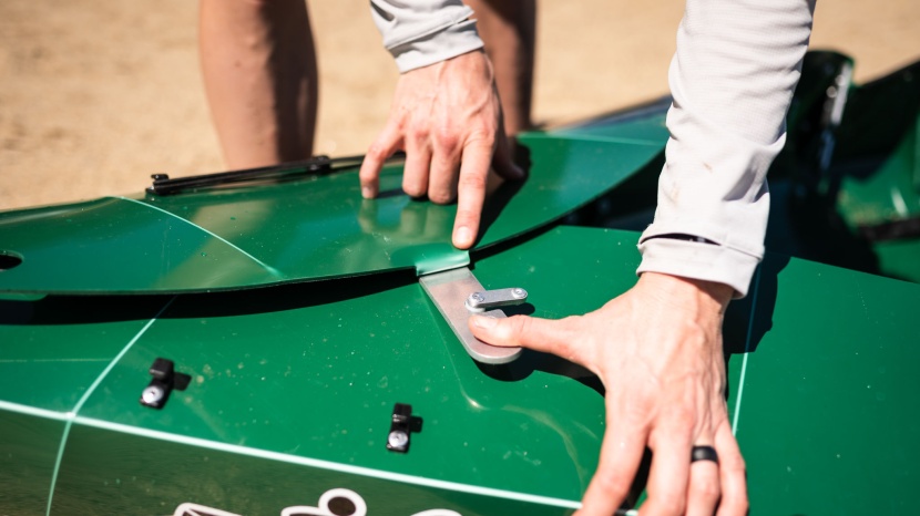 tucktec folding kayak - folding the metal arms all the way over to assemble this boat...