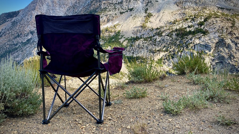 like many traditional camping chairs, the accordion-style design is...