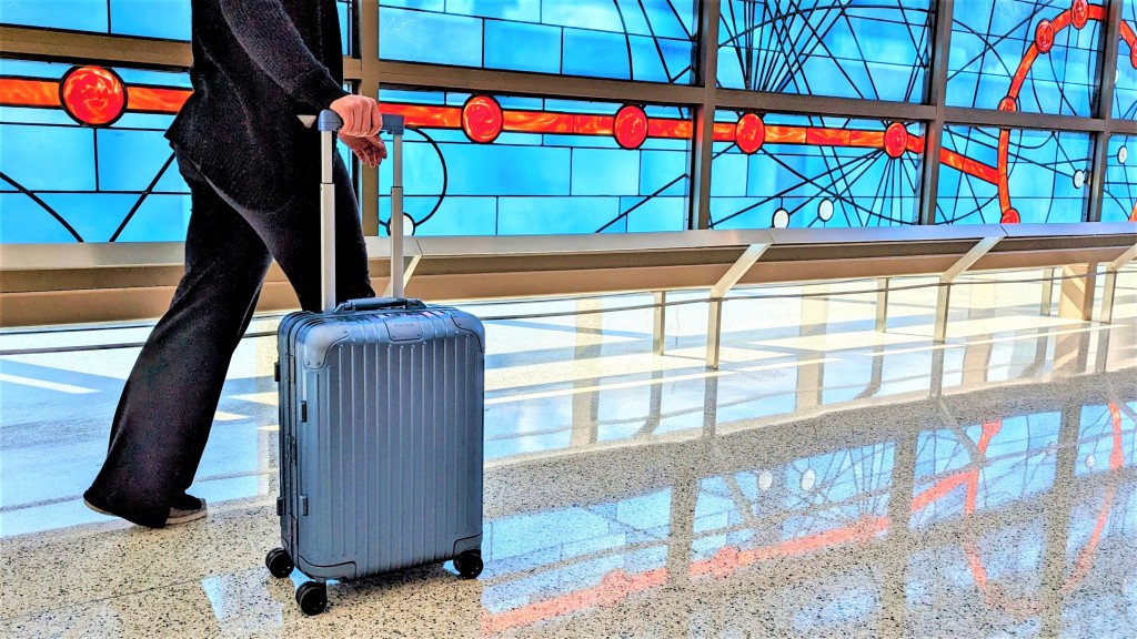 rimowa original cabin - i loved how our rimowa perfectly matched the airport's public art...