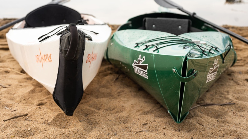 tucktec folding kayak - the tucktec (green, right) has an open crevice on the bow keel...