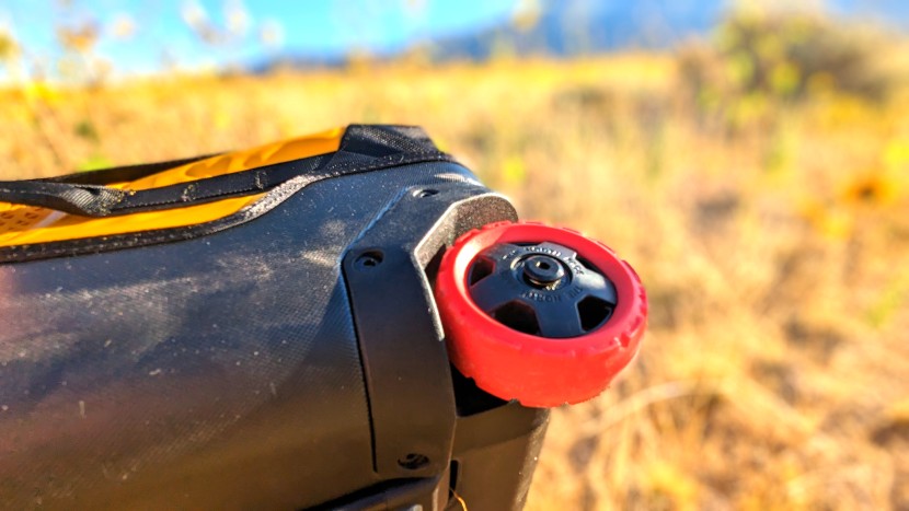 thick, bolted wheel-housing trim protects the wheels and the case...