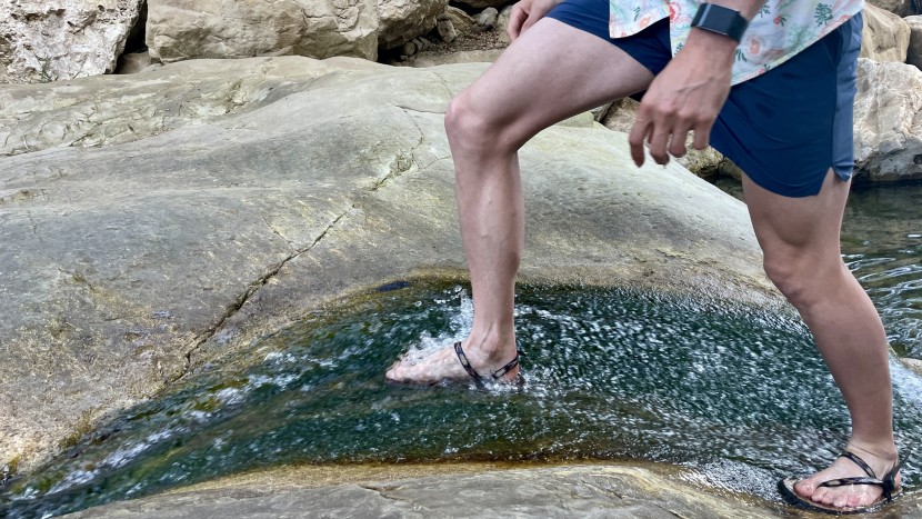 sandals mens - the earth runners alpha working its way up a slimy wet surface with...