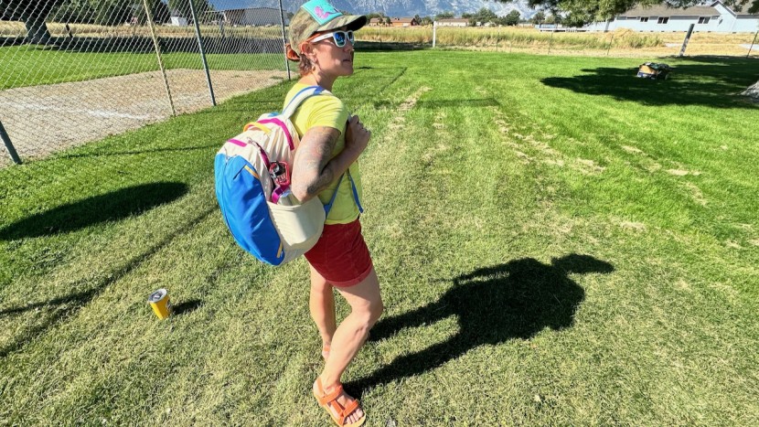 we bent over, took turns, slung packs over one shoulder, and loaded...