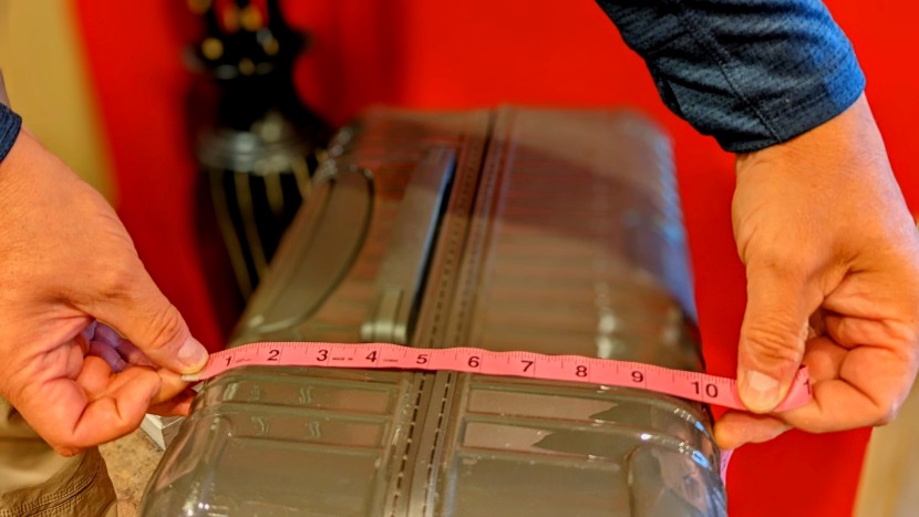 rimowa essential check-in l - measuring the exterior depth of our rimowa. it's smaller than other...