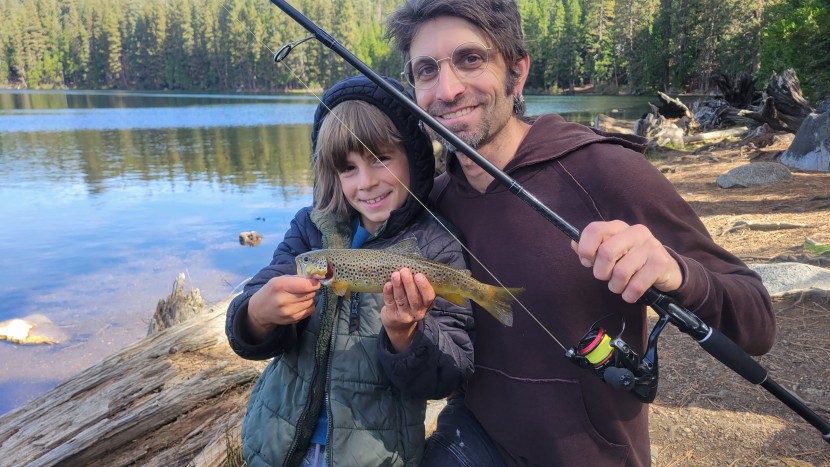 our friend isaac and his son, gavi, catching trout after trout with...