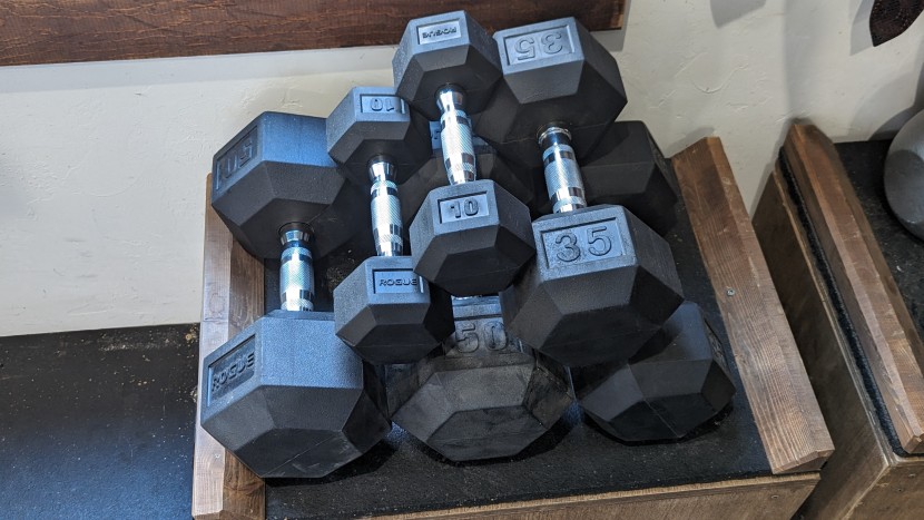 rogue rubber hex dumbbells - one of our testing team members stores their hex dumbbells in a...