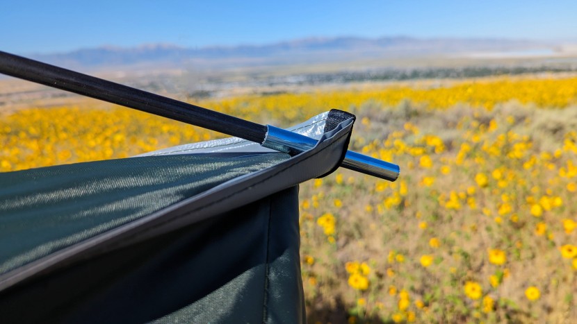 built-in, top-grade fiberglass poles that anchor into reinforced...