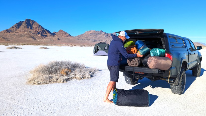 camping sleeping bag - packing up after a weekend of side-by-side testing in utah's salt...