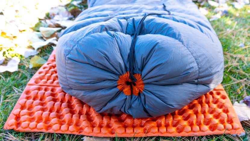 footbox, zipped, snapped, and cinched.