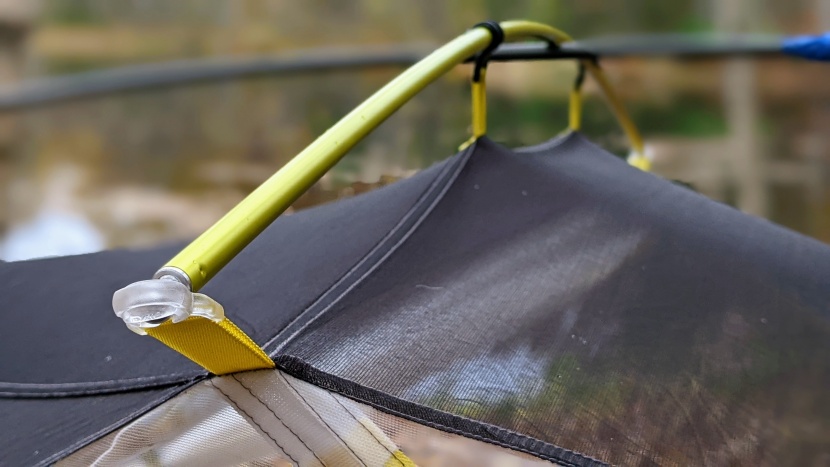 the loop of webbing under the cross pole helps you stretch the tent...