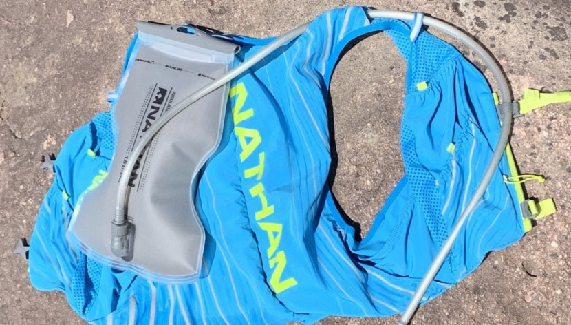 hydration pack for running men - the pinnacle's 1.6l reservoir is hourglass-shaped, which helps it...