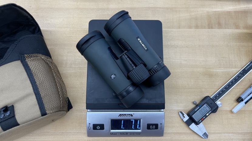 weighing the vortex viper 8x12 binoculars in our lab.