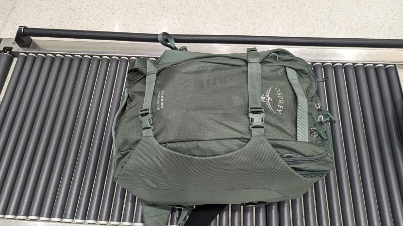 osprey sojourn porter 46l - the padded clamshell exterior cinch straps protect contents from...