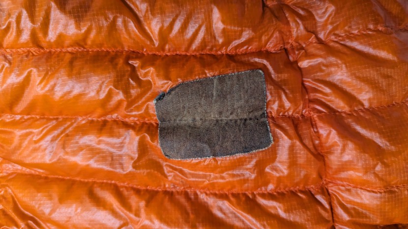 mountain hardwear ghost whisperer - a close-up of the thin fabric on my well-worn ghost whisperer with a...