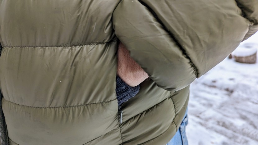 wantdo packable down hoody - it has extremely small zippers on the hand pockets.