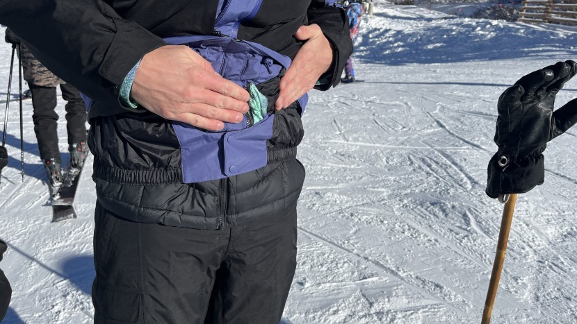 the north face thermoball eco snow triclimate has a powder skirt...