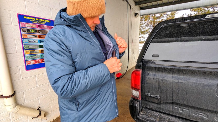 rei co-op stormhenge down hybrid parka - storing our wallet in the interior pocket before things got serious...