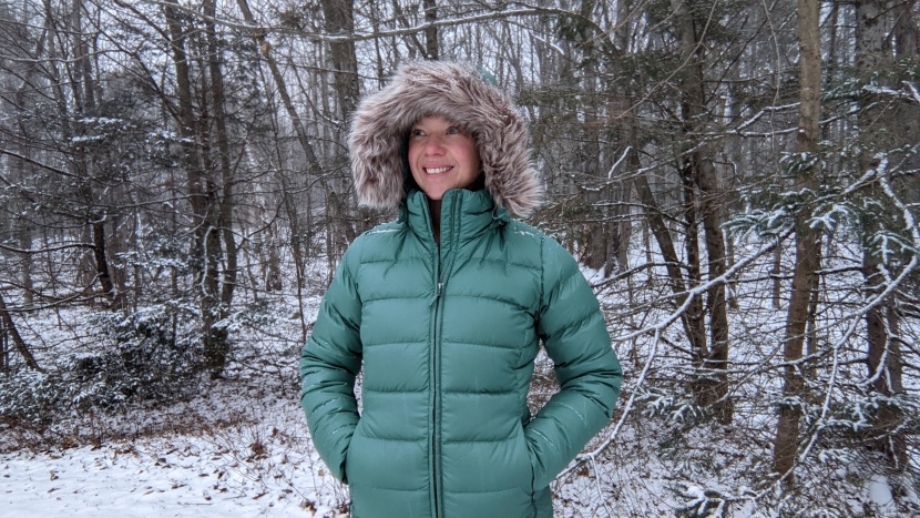 a deep hood, plenty of plush down filling, and a wind-blocking fur...