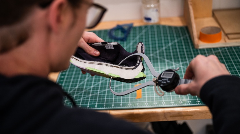 running shoes - we cut each shoe in half to measure stack height and examine inner...