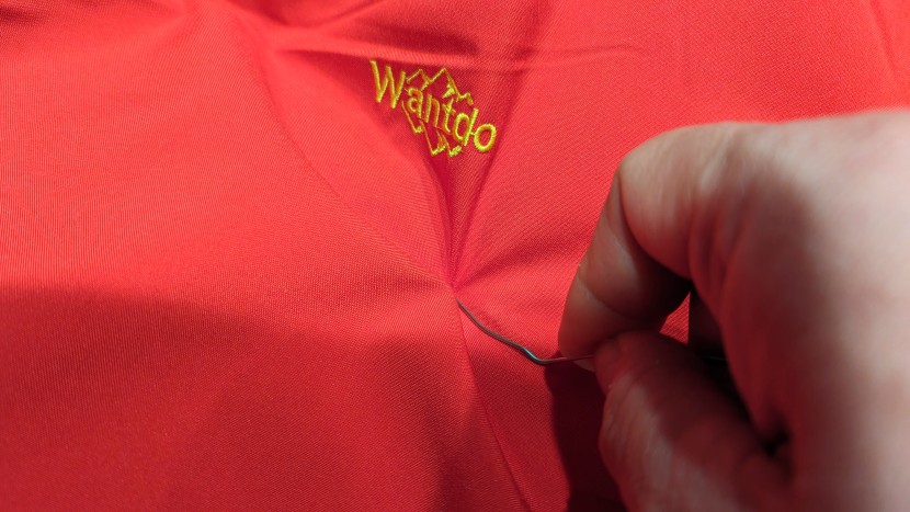 wantdo waterproof snow jacket - using metal to test this jacket's mettle.