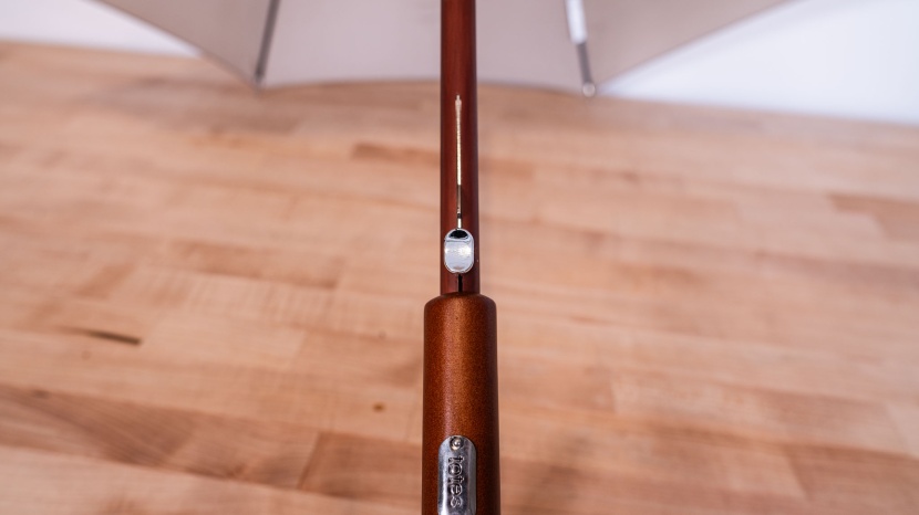 totes auto open wooden - the button isn't hidden within the handle like many of the compact...