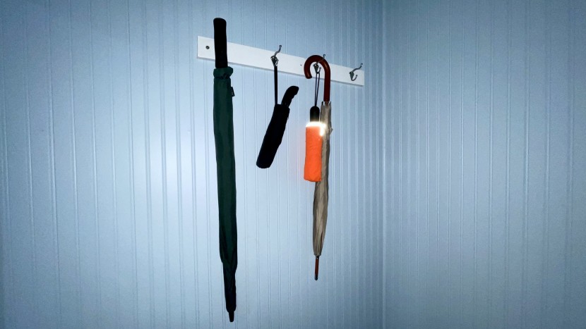 umbrella - sling or leash, multiple competitors are shown hanging, which is...