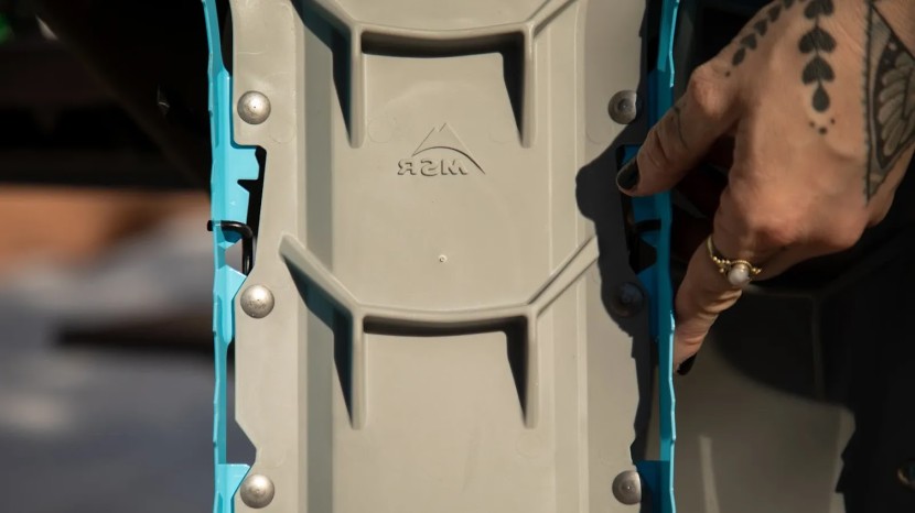 snowshoes womens - horizontal bars on the base of the shoe create friction breaking on...