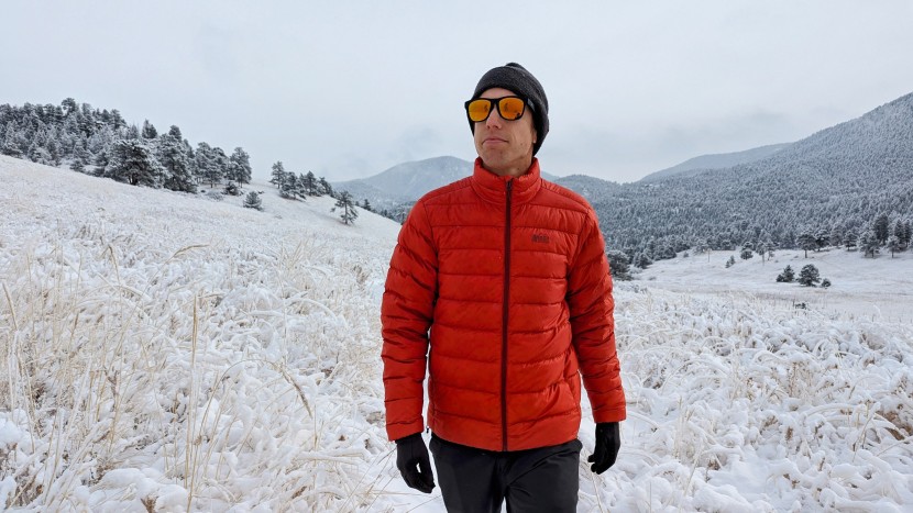 rei co-op 650 down - the collar covers most of your neck when zipped up all the way.
