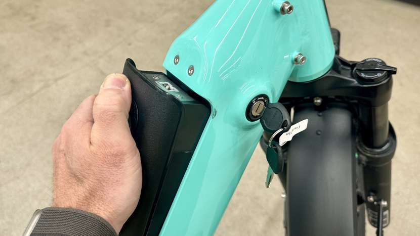 the lockable battery integrates neatly into the bike's top tube.