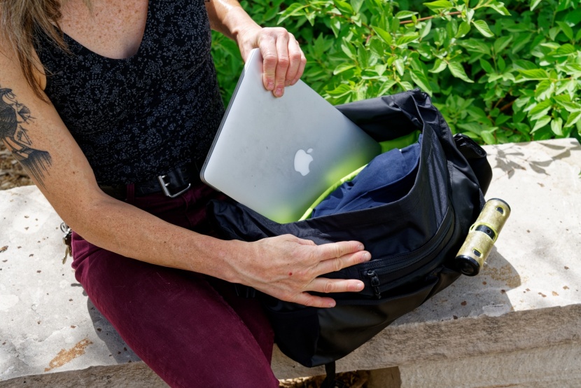 we love that this bag has multiple laptop pockets, one of which is...