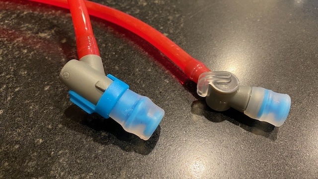 hydration pack - on the left is a twist-close bite valve versus a flip switch on the...