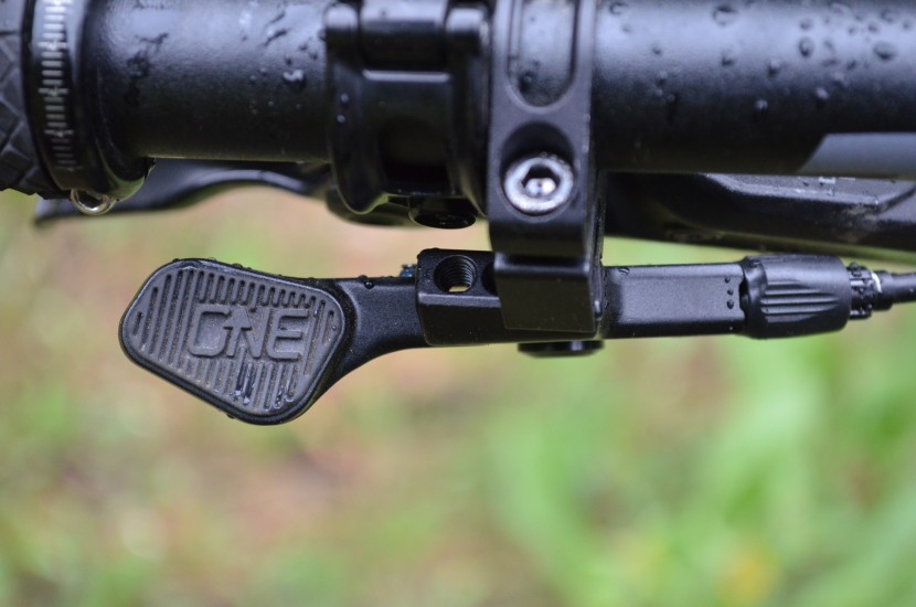 oneup components v3 - the remote is adjustable and the grip pad comes in seven fun colors.