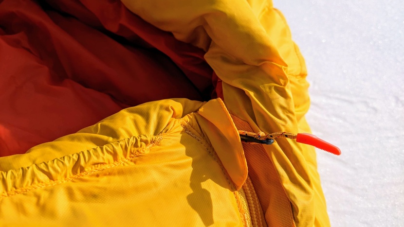 marmot never summer 0 - a cover helps to protect your face from the zipper slider when you...