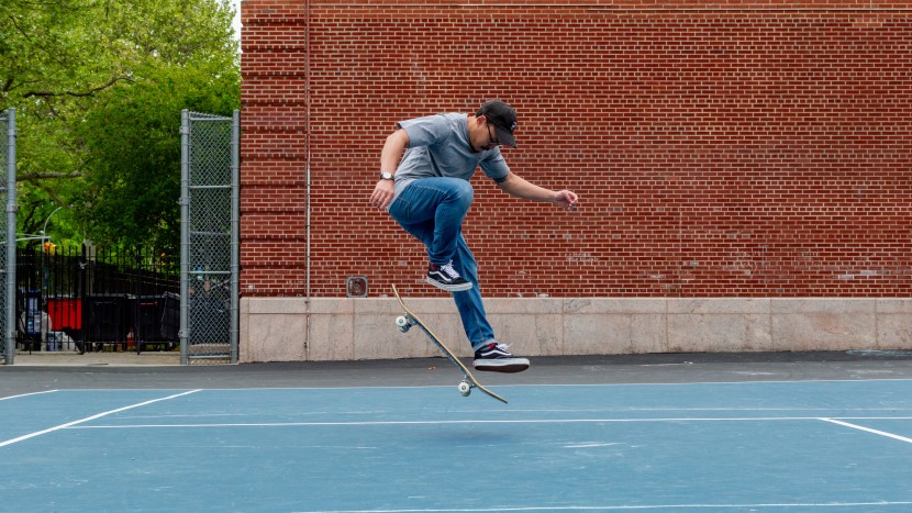 popping a switch frontside bigspin in the vans old skool.